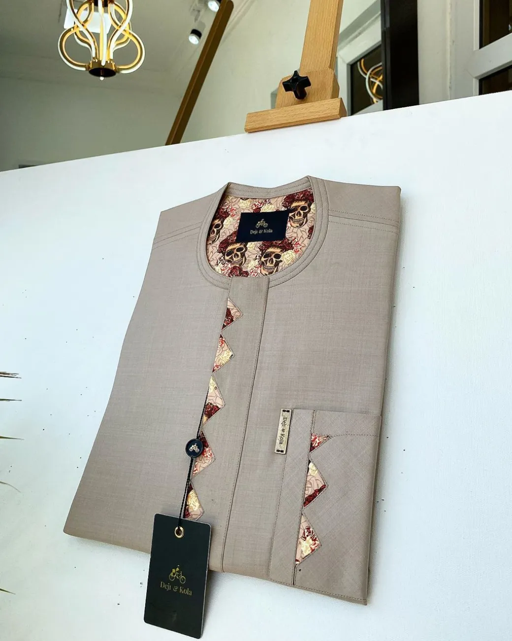A Dark cream african kaftan With Paisley detailing