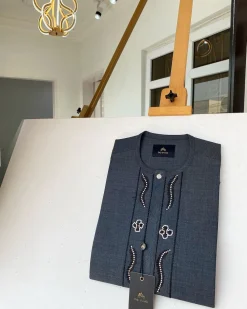 A Dark grey Irish petal embroidery detail and a mid-section flap button Swarovski African Kaftan