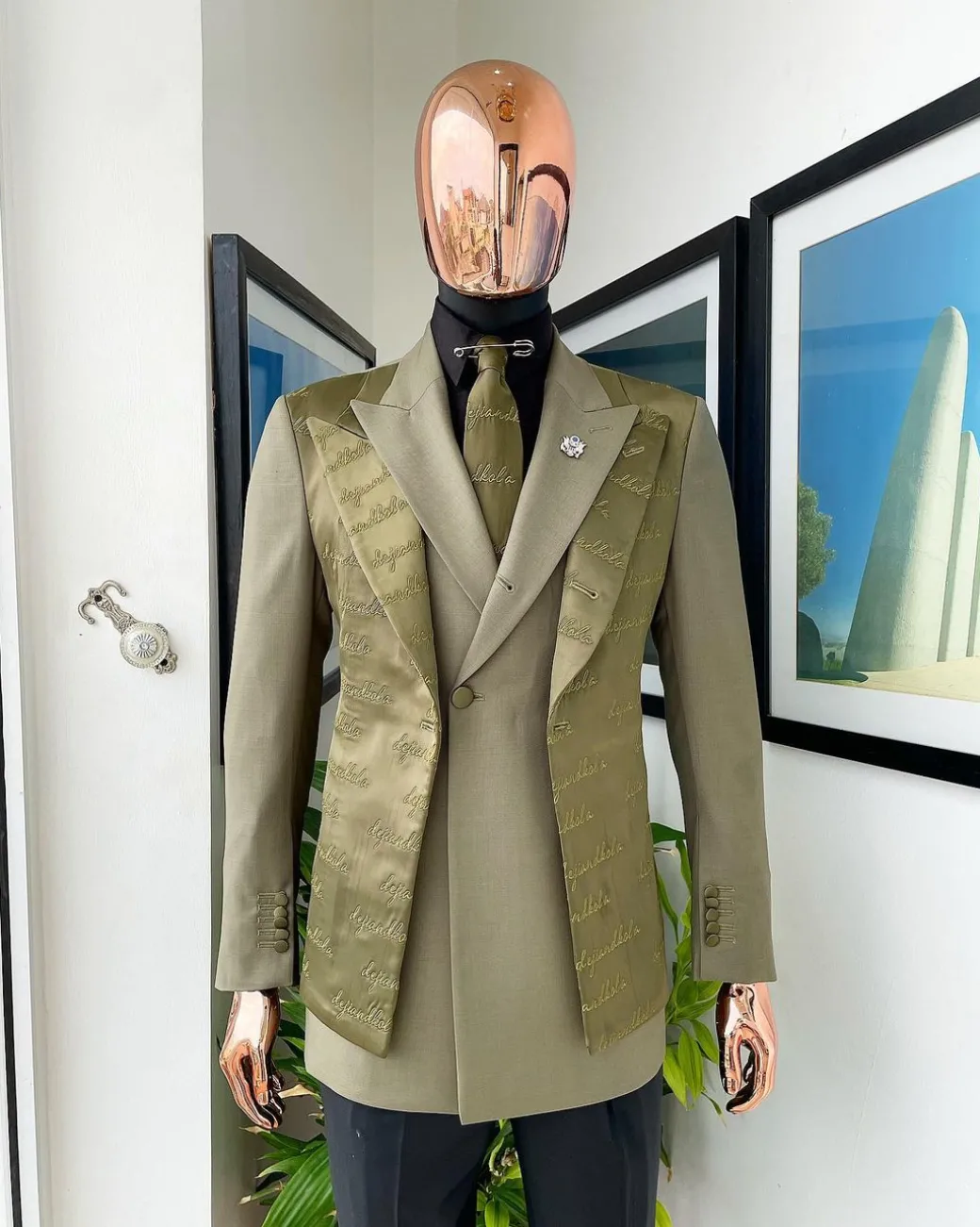 A Dark olive green “scritto” (inscribe your name), layered 4 lapels, double-breasted, out-waisted jointed jacket