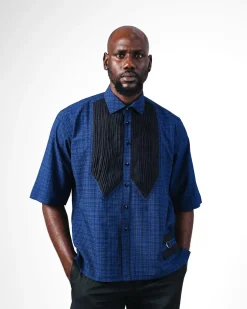 A Dark Skye blue and black Checkered, front pointed pleat, jet black studded Swarovski button, short sleeve, wide-cut casual shirt