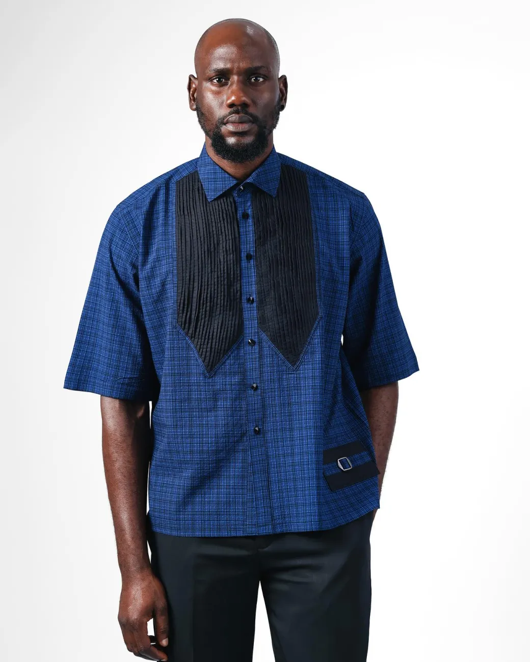 A Dark Skye blue and black Checkered, front pointed pleat, jet black studded Swarovski button, short sleeve, wide-cut casual shirt