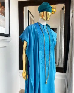 A Deep sky blue Embroidery Agbada, hand knitted aso oke cap, kaftan and sokoto
