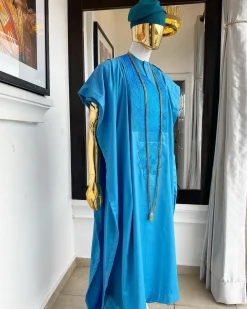 A Deep sky blue Embroidery Agbada, hand knitted aso oke cap, kaftan and sokoto