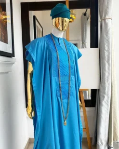 A Deep sky blue Embroidery Agbada, hand knitted aso oke cap, kaftan and sokoto
