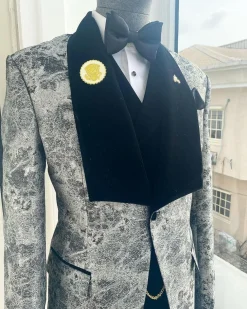 A dispersed silver and black pattern jacquard shawl lapel tuxedo suit