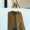 A Divided section of different shades of brown African senator kaftan