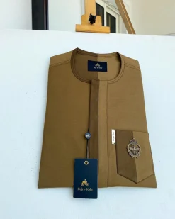 A Divided section of different shades of brown African senator kaftan