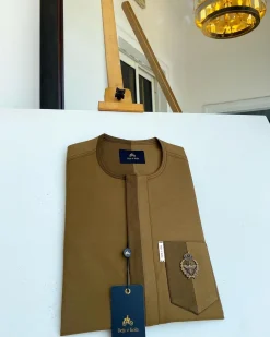 A Divided section of different shades of brown African senator kaftan