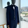 A “duopoly” navy blue royal tuxedo suit