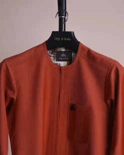 A fire orange and black pencil stripe, zipline, 3/4 sleeve African senator kaftan native.