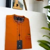 A Fire Orange, covered button, paisley design African traditional senator kaftan native.