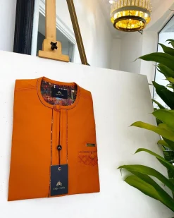 A Fire Orange, covered button, paisley design African traditional senator kaftan native.