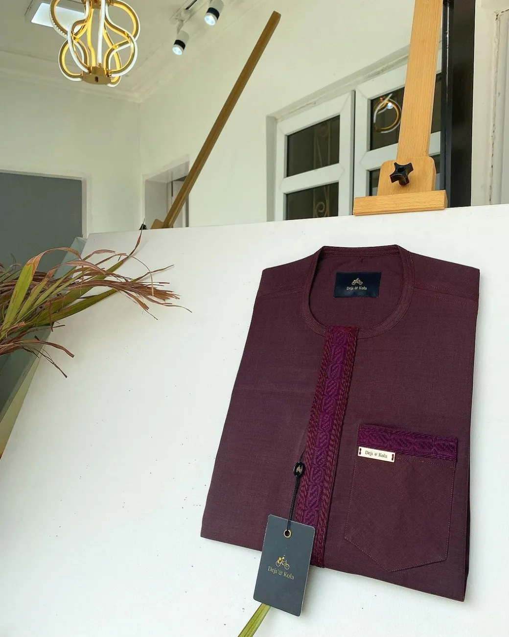 A Flap burgundy embroidery kaftan with a matching pocket design and Sokoto