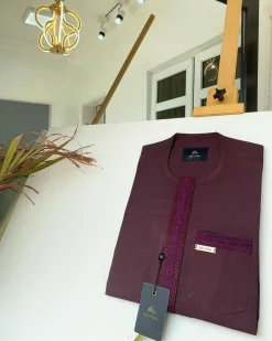 A Flap burgundy embroidery kaftan with a matching pocket design and Sokoto