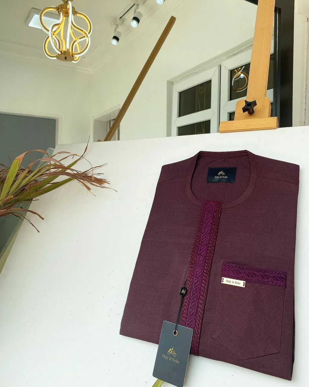 A Flap burgundy embroidery kaftan with a matching pocket design and Sokoto