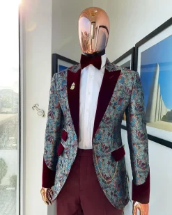 A floral paisley mahogamy red soaked Italian velvet peak lapel suit