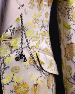 A Floral splashed yellow, mocha and cedar brown, knitted, peak lapel tuxedo suit