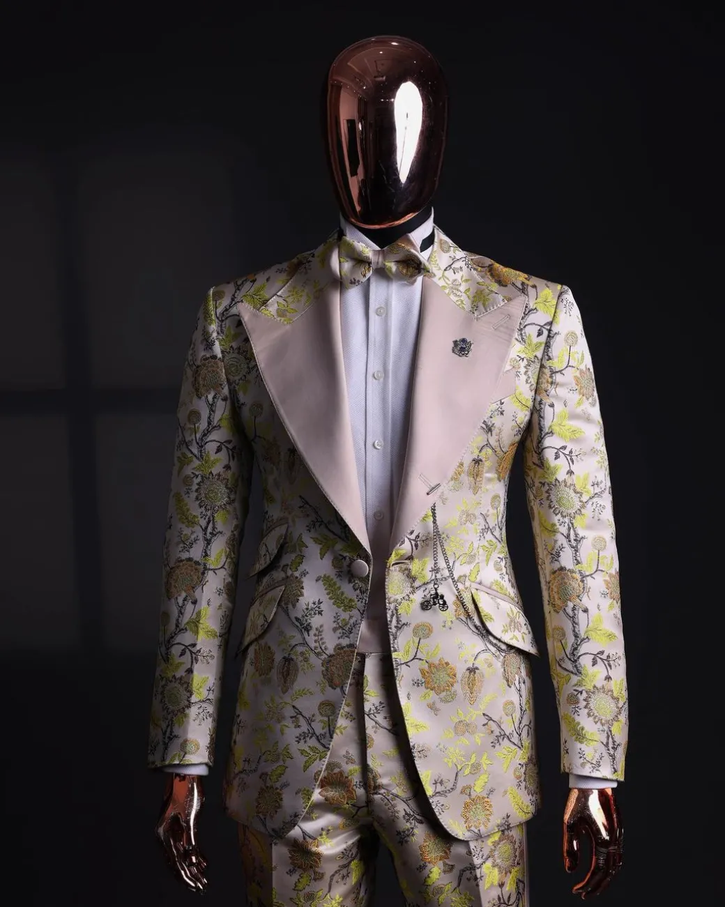 A Floral splashed yellow, mocha and cedar brown, knitted, peak lapel tuxedo suit