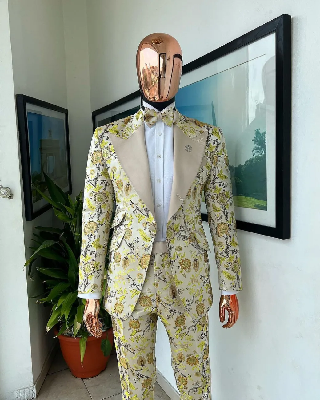 A Floral splashed yellow, mocha and cedar brown, knitted, peak lapel tuxedo suit