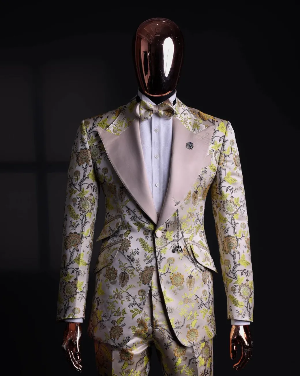 A Floral splashed yellow, mocha and cedar brown, knitted, peak lapel tuxedo suit