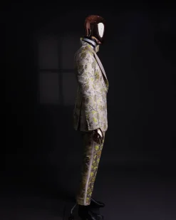 A Floral splashed yellow, mocha and cedar brown, knitted, peak lapel tuxedo suit
