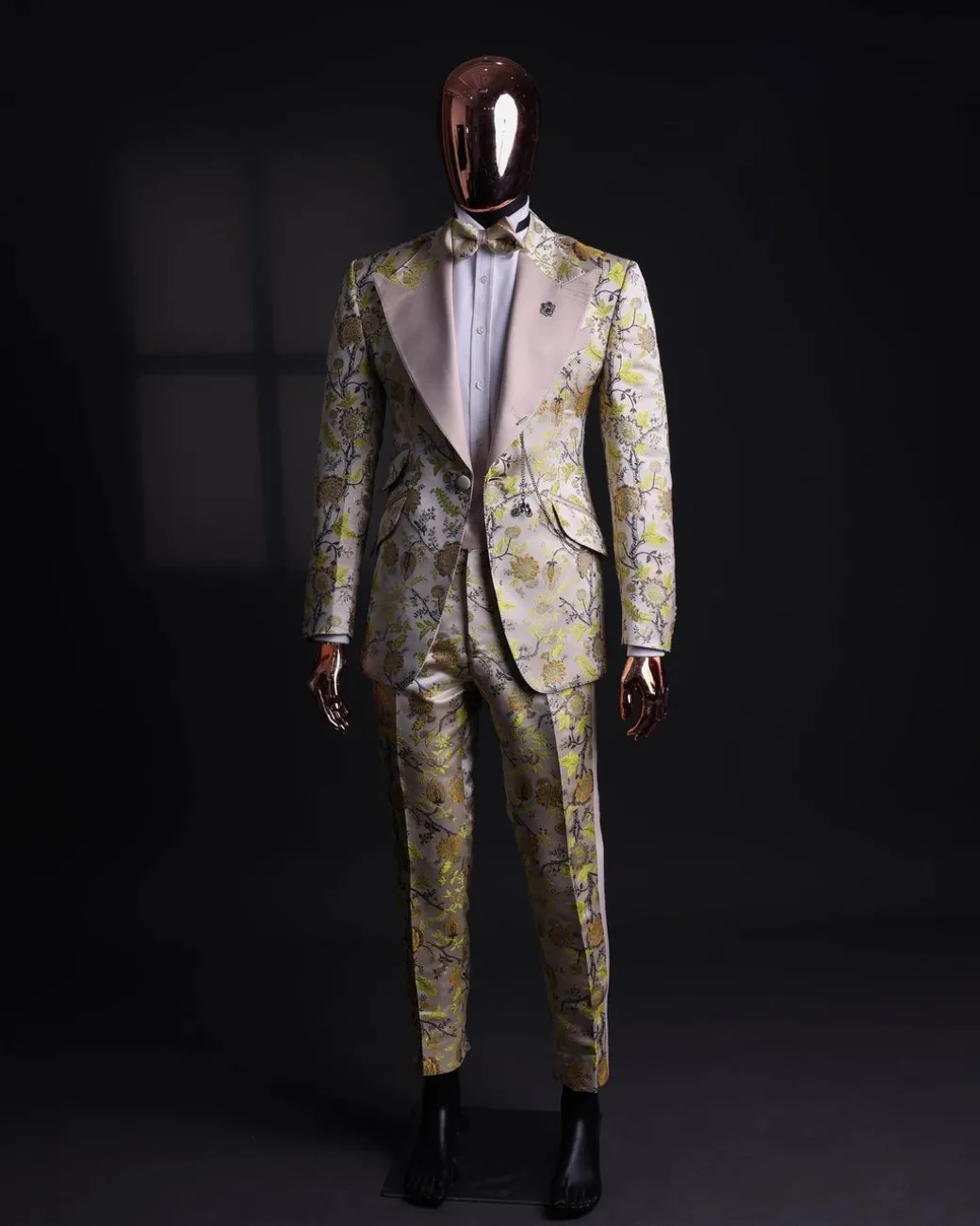A Floral splashed yellow, mocha and cedar brown, knitted, peak lapel tuxedo suit