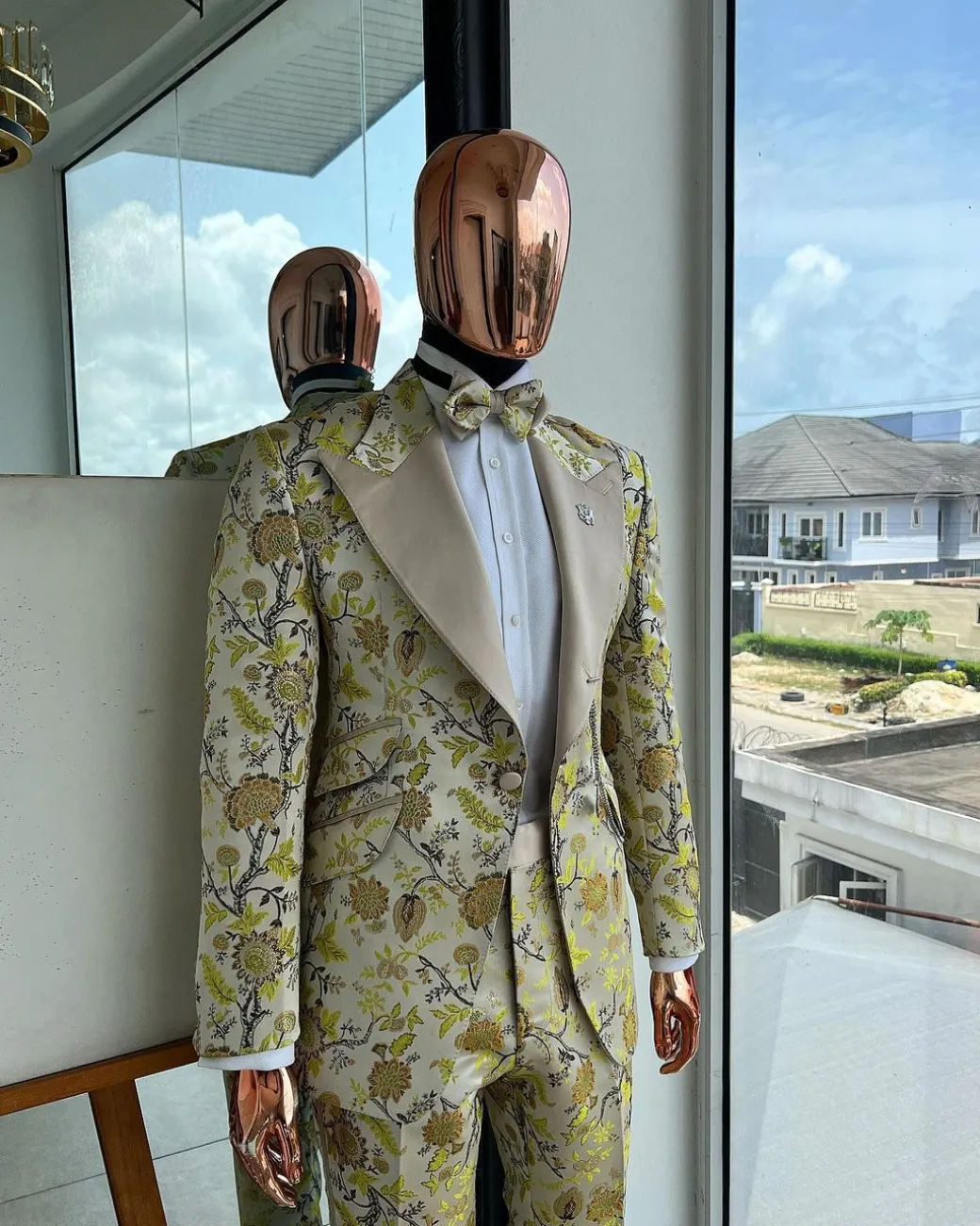 A Floral splashed yellow, mocha and cedar brown, knitted, peak lapel tuxedo suit