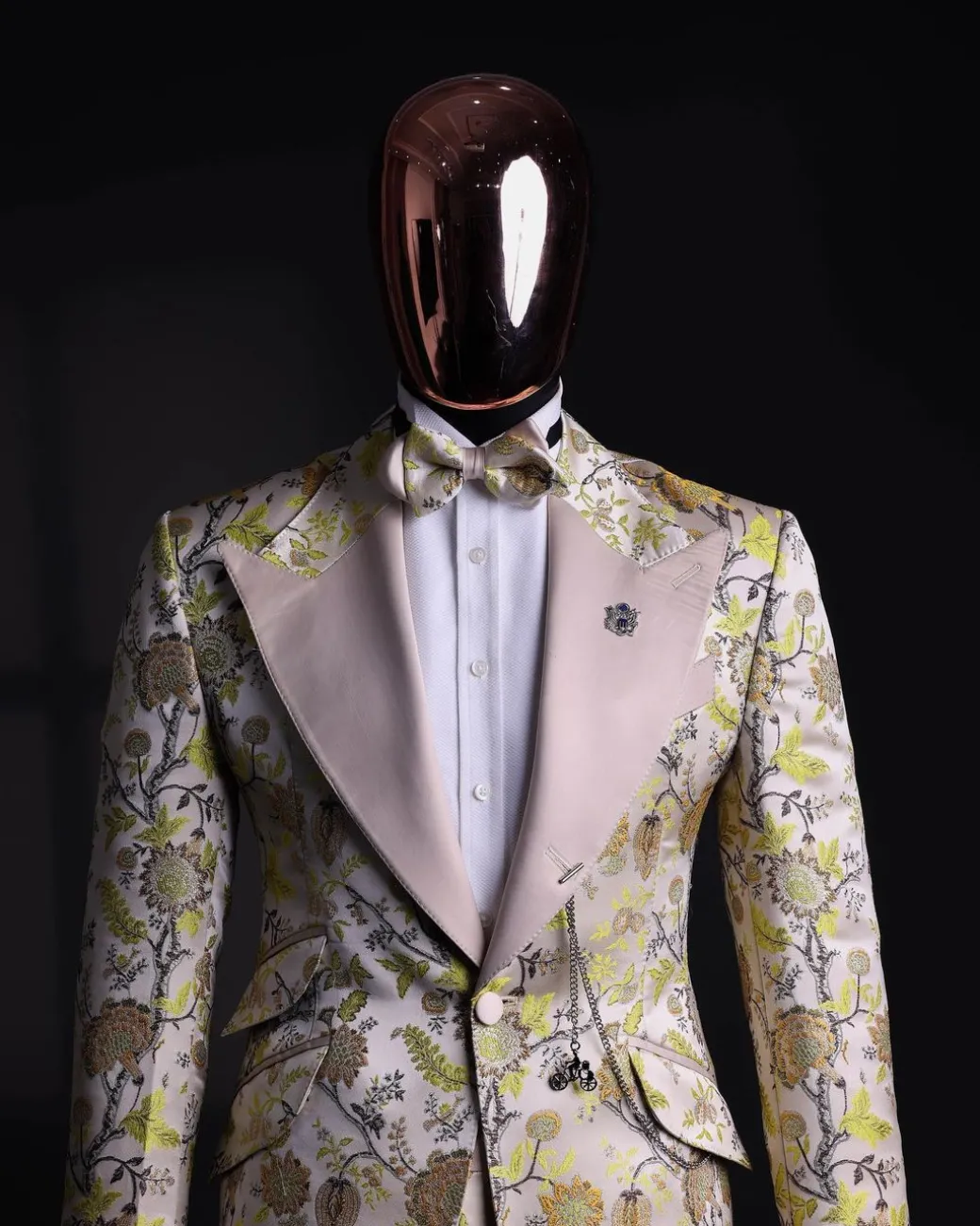 A Floral splashed yellow, mocha and cedar brown, knitted, peak lapel tuxedo suit
