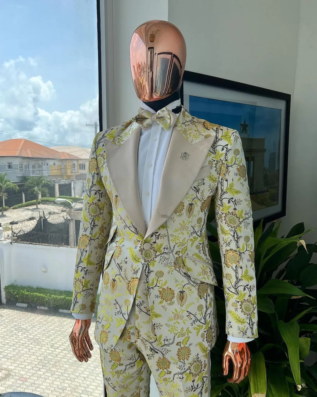 A Floral splashed yellow, mocha and cedar brown, knitted, peak lapel tuxedo suit
