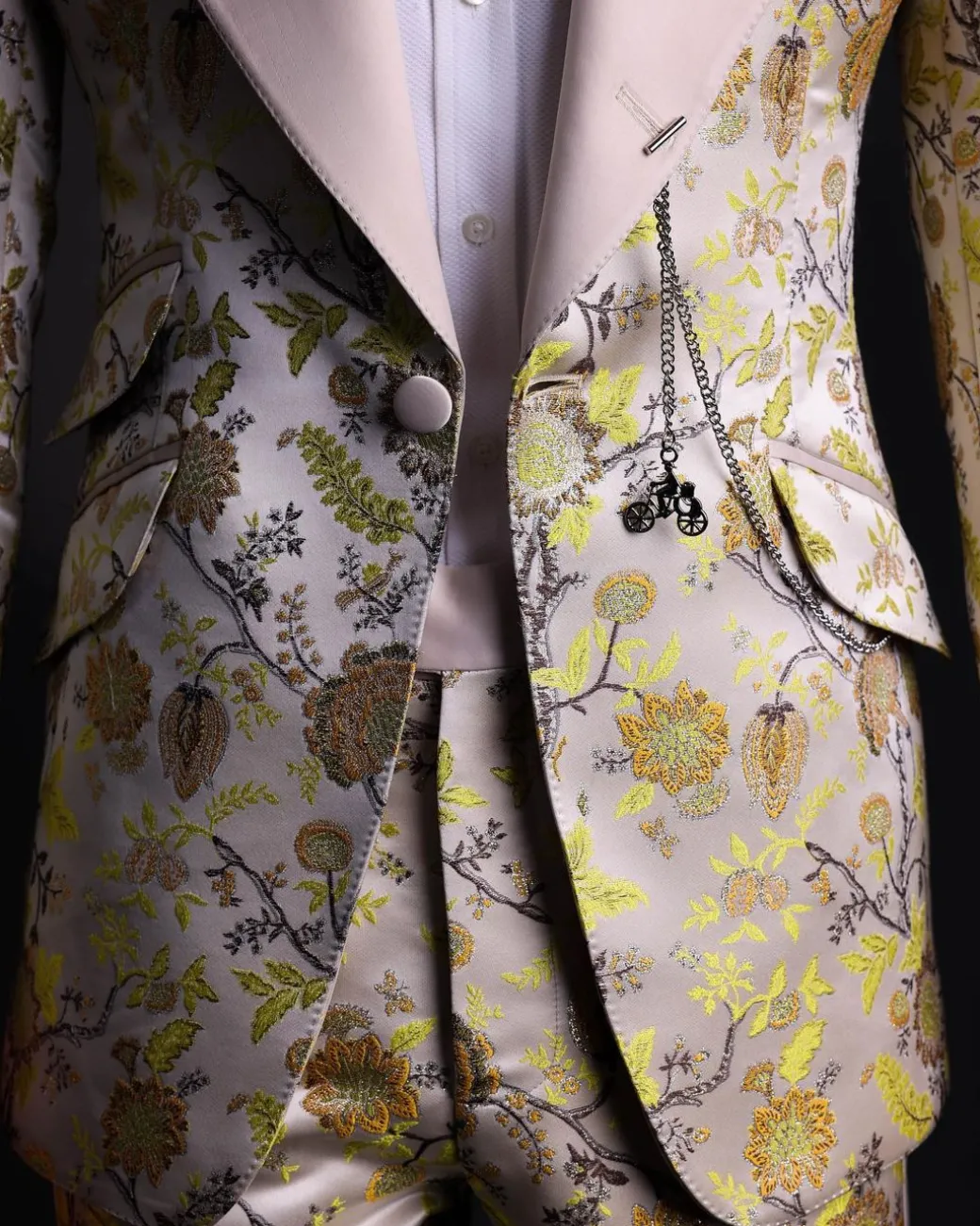 A Floral splashed yellow, mocha and cedar brown, knitted, peak lapel tuxedo suit