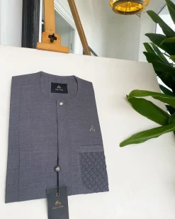 A Fossil grey, clear view silver Swarovski buttons, ruffle pocket details African traditional senator kaftan native.