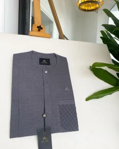 A Fossil grey, clear view silver Swarovski buttons, ruffle pocket details African traditional senator kaftan native.