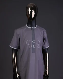 A Fossil grey front flap with crystal Swarovski button, world map embroidery detailing kaftan, and Sokoto