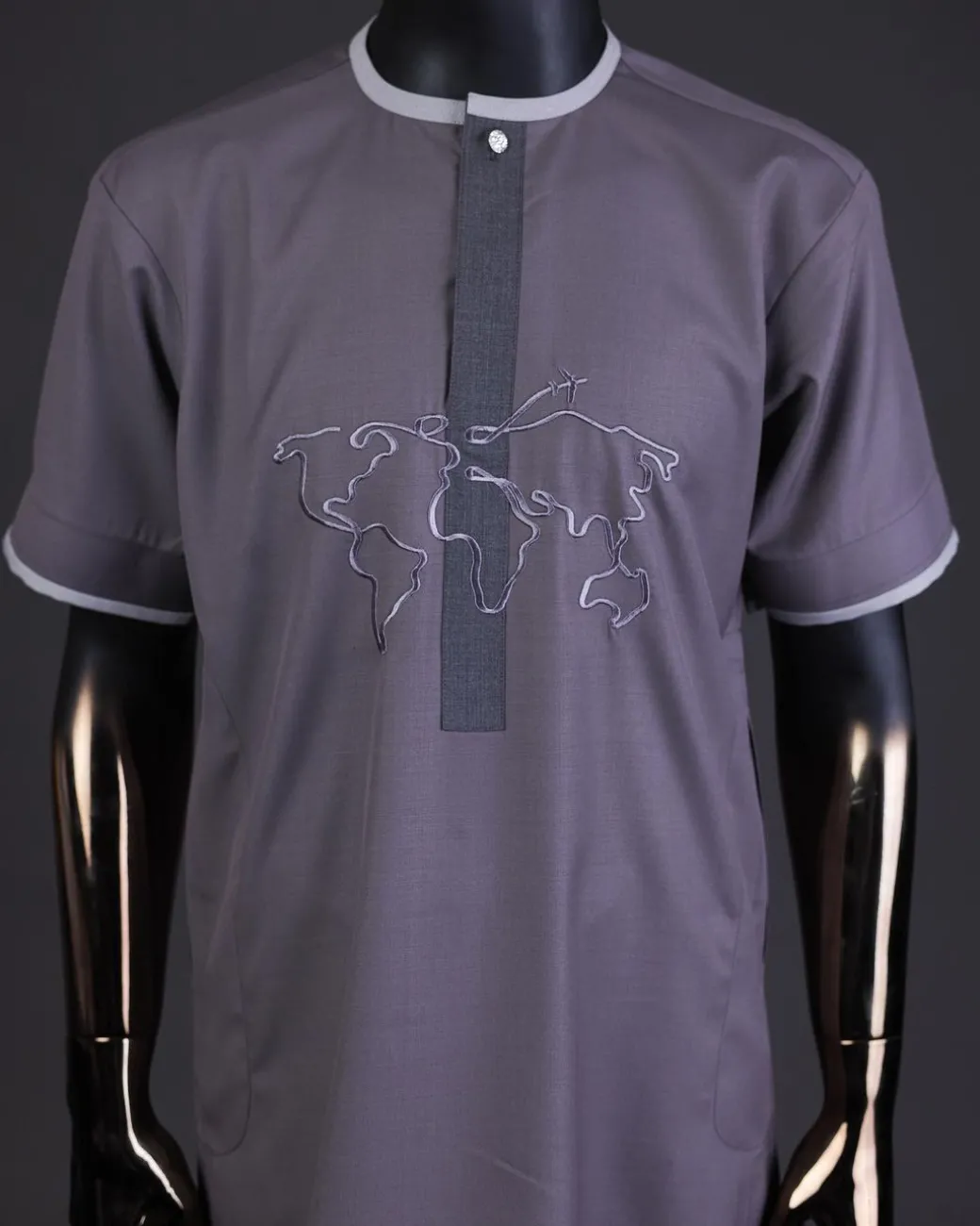 A Fossil grey front flap with crystal Swarovski button, world map embroidery detailing kaftan, and Sokoto