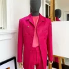 A Fuchsia Pink Floral Safari Suit.