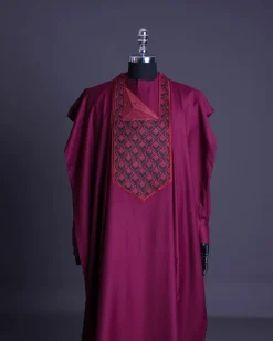 A Garnet red, redundant flame embroidery detailing agbada