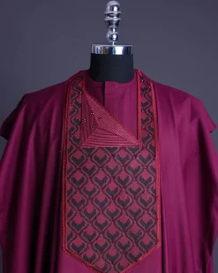 A Garnet red, redundant flame embroidery detailing agbada