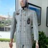 A glen check Arctic blue and honey orange “preacher” double breasted safari suit