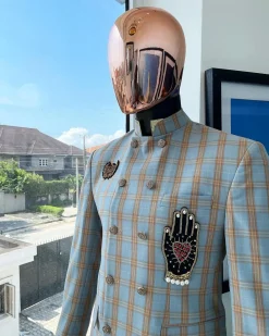 A glen check Arctic blue and honey orange “preacher” double breasted safari suit