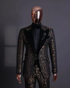 A Gold and black mandarin metallic floral jacquard, peak lapel tuxedo suit.