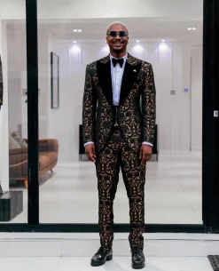 A Gold and black mandarin metallic floral jacquard, peak lapel tuxedo suit