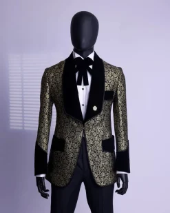 A Gold and black patterned metallic Jacquard tuxedo suit with sharaba wooven edge detailing