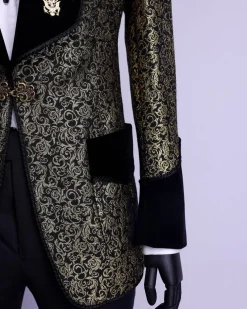 A Gold and black patterned metallic Jacquard tuxedo suit with sharaba wooven edge detailing