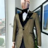 A Gold And Black Zig-Zag Pattern Tuxedo Suit