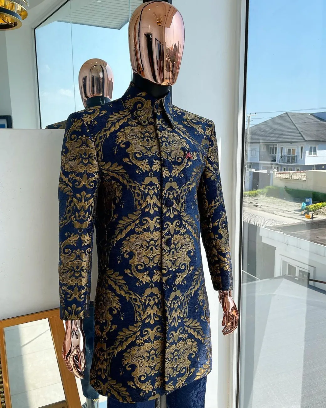 A Gold and blue “Mandarin” jacquard floral safari suit
