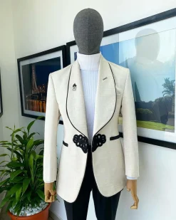 A Gold and ivory “Mandarin” invisible Pattern Ivory white shawl lapel jacquard Suit