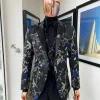 A Gold, black, and blue peak lapel, raven, and forest metallic pattern jacquard dinner suit