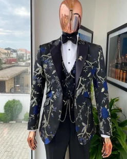 A Gold, black, and blue peak lapel, raven, and forest metallic pattern jacquard Suit