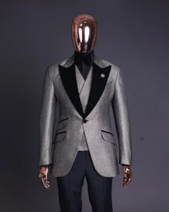 A Gold, black and silver mix metallic jacquard, peak lapel tuxedo suit