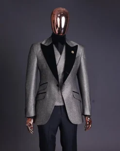 A Gold, black and silver mix metallic jacquard, peak lapel tuxedo suit